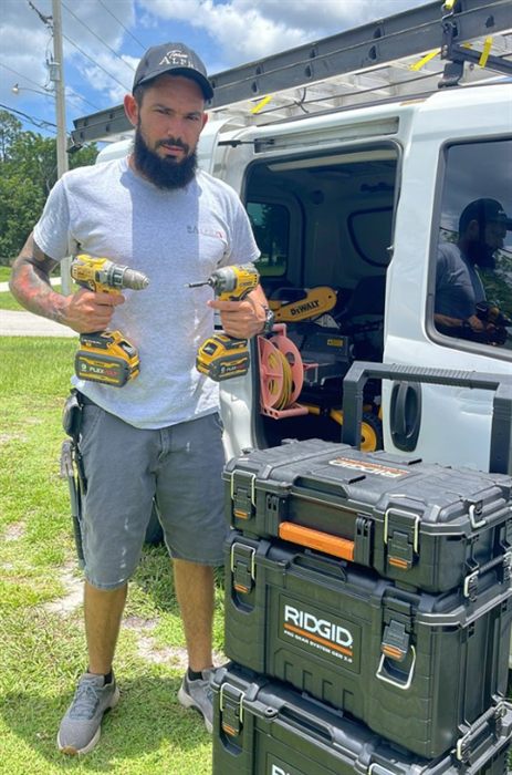 Kile Services handyman with tools